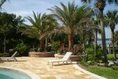pool-patio-with-tumbled-stone-planter-tampa